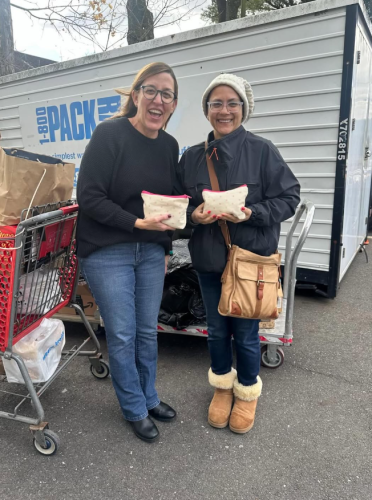 Board member Vinita Gangu recently delivered care packages to The Betsy and Peter Fischer Food Pantry, providing essential items to families in need.